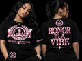 pink tee front and honor is a vibe on black background